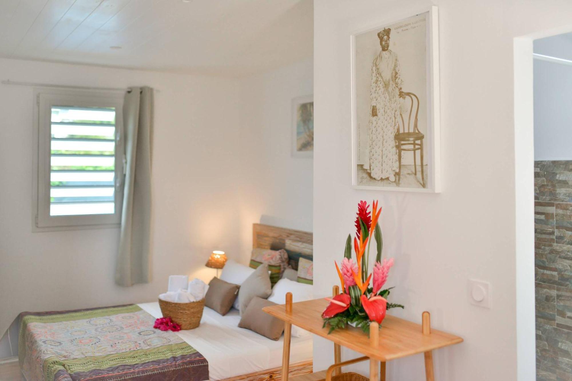Les jardins de CHANTILLY -Bungalows avec jardins et piscines privées Baie-Mahault Habitación foto